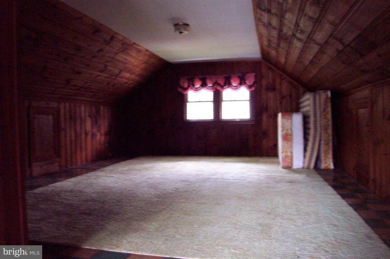 103 Rambler Road Cambridge, MD 21613 - Photo 15 of 19 Attic is finished with windows at each end