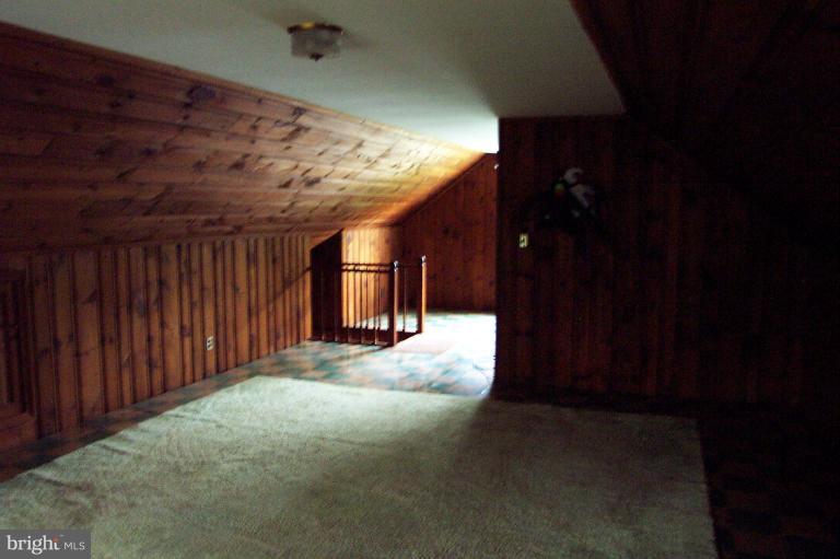 103 Rambler Road Cambridge, MD 21613 - Photo 16 of 19 Finished attic showing stairs