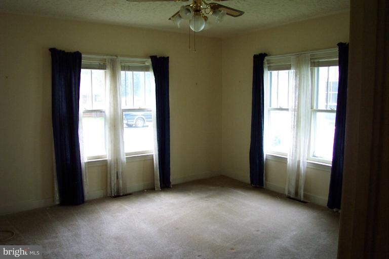 103 Rambler Road Cambridge, MD 21613 - Photo 6 of 19 Bedroom 1 is large with lots of windows