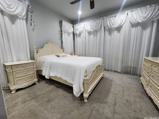 a view of a workspace with furniture