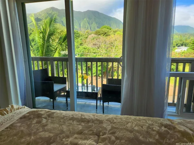 a bathroom with a sink shower and a mirror