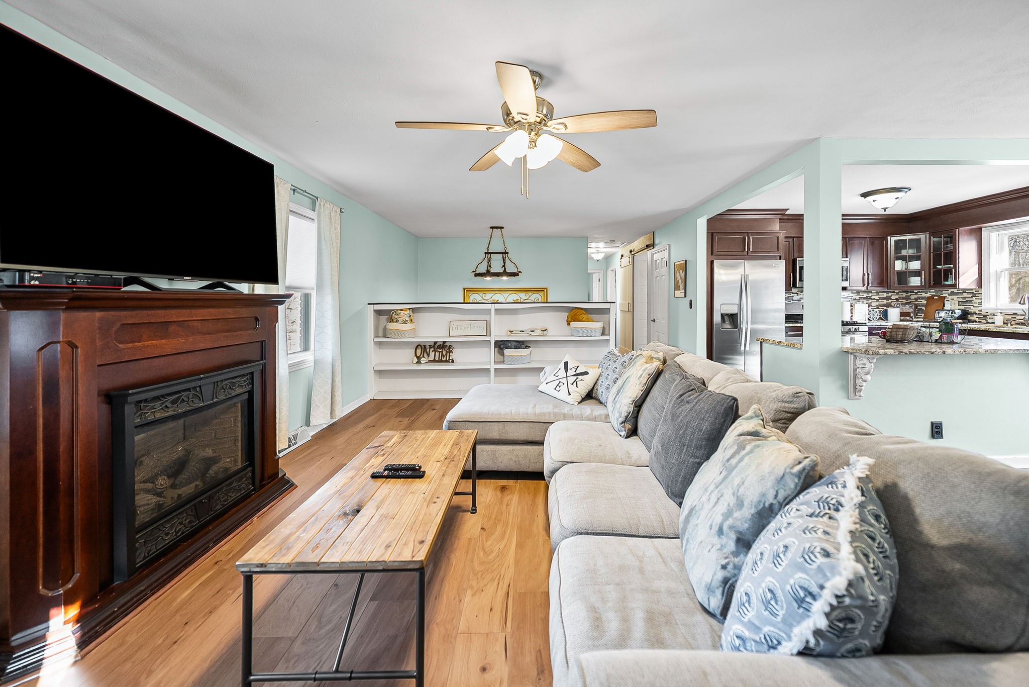 148 Green Hill Drive Grand Rivers, KY 42045 - Photo 12 of 65 a living room with furniture fireplace and flat screen tv