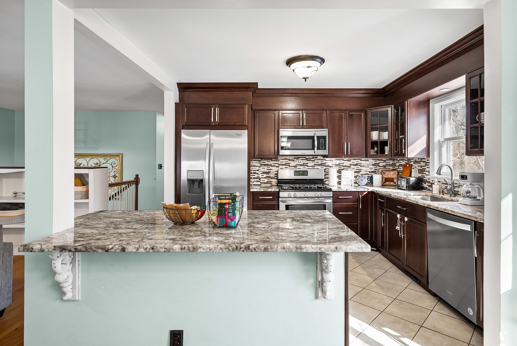 148 Green Hill Drive Grand Rivers, KY 42045 - Photo 16 of 65 a kitchen with counter top space cabinets and stainless steel appliances