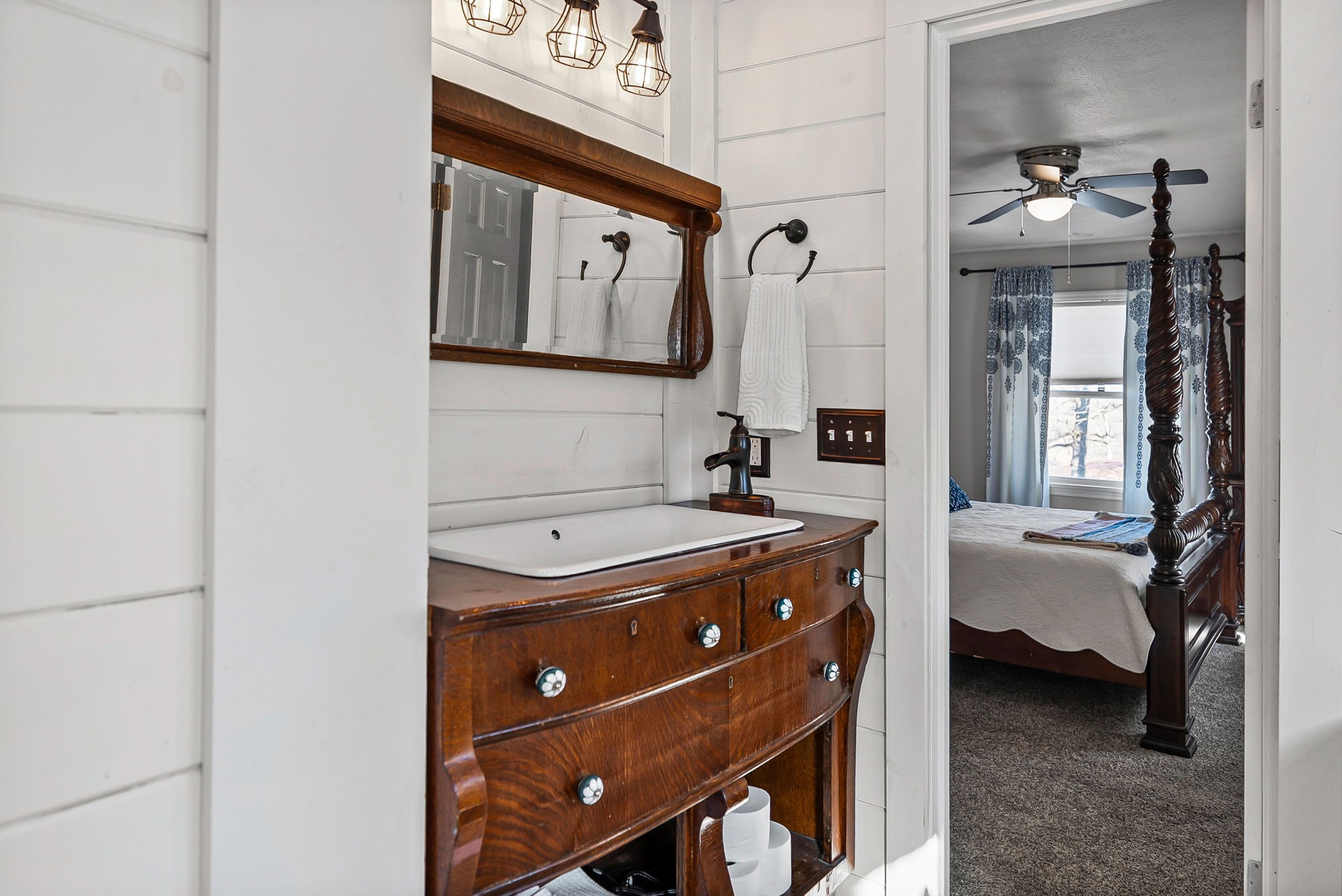 148 Green Hill Drive Grand Rivers, KY 42045 - Photo 25 of 65 a view of bathroom with a sink and a mirror