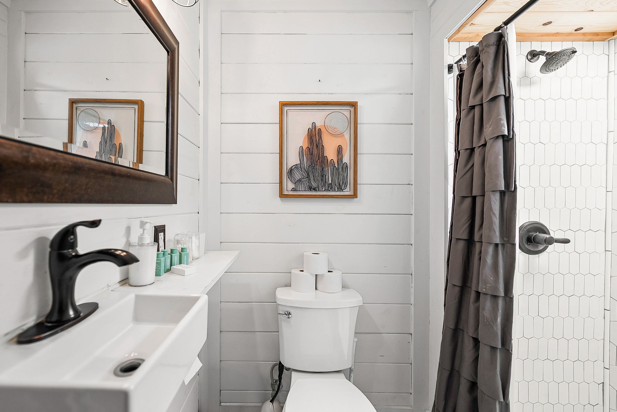 148 Green Hill Drive Grand Rivers, KY 42045 - Photo 29 of 65 a bathroom with a sink and mirror with toilet