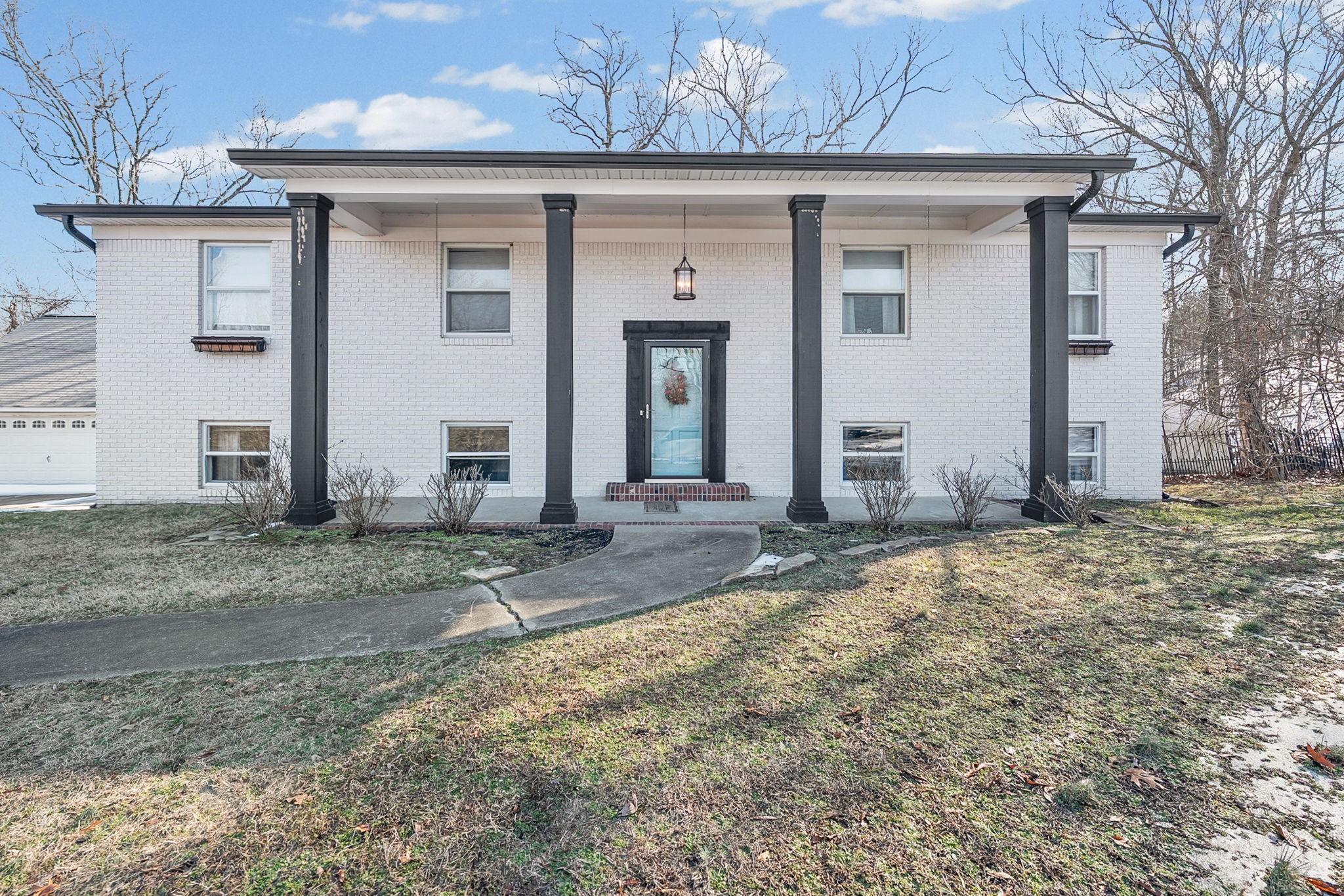 148 Green Hill Drive Grand Rivers, KY 42045 - Photo 3 of 65 a view of a house with a backyard