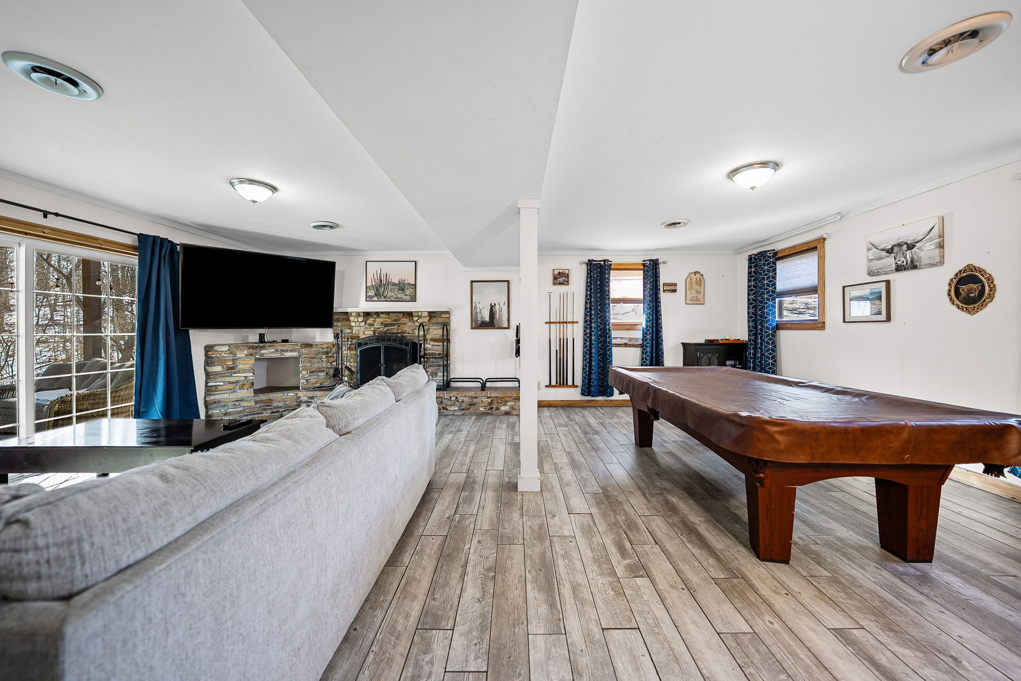 148 Green Hill Drive Grand Rivers, KY 42045 - Photo 33 of 65 a living room with furniture and a flat screen tv