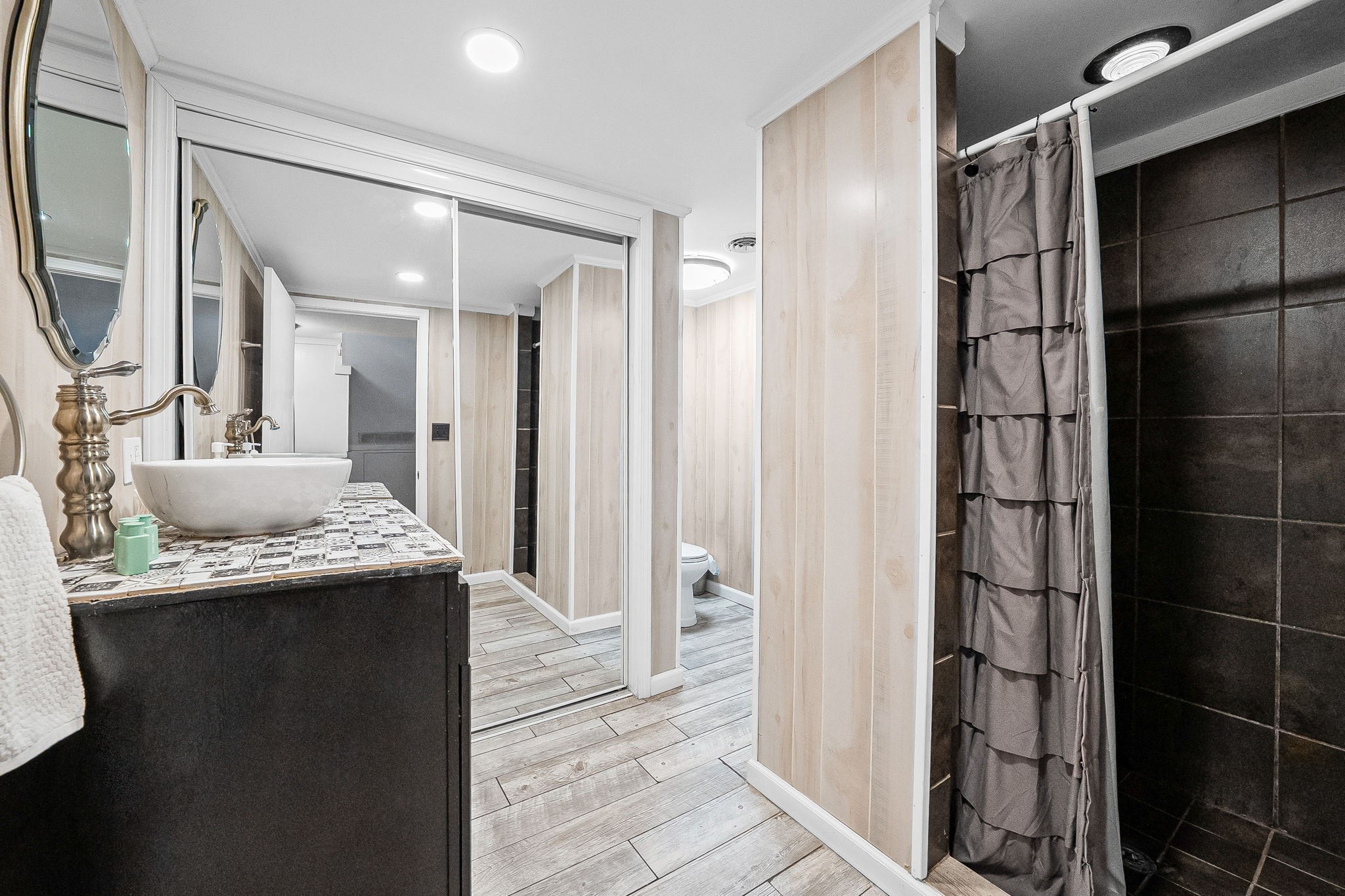 148 Green Hill Drive Grand Rivers, KY 42045 - Photo 41 of 65 a view of bathroom with a shower and a sink