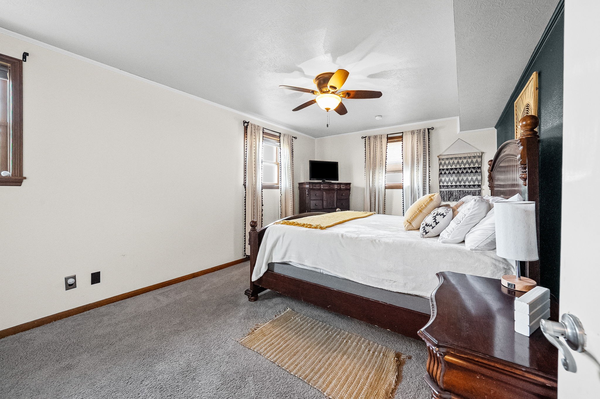 148 Green Hill Drive Grand Rivers, KY 42045 - Photo 42 of 65 a bed room with a bed and a chandelier