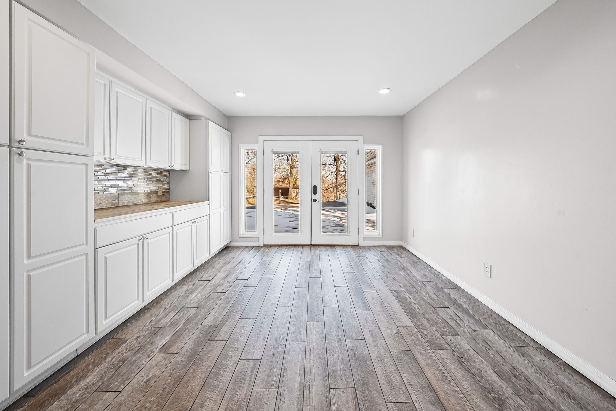 148 Green Hill Drive Grand Rivers, KY 42045 - Photo 46 of 65 a view of a kitchen with wooden floor and electronic appliances