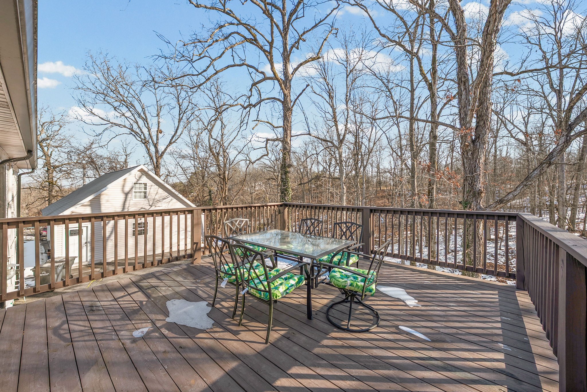148 Green Hill Drive Grand Rivers, KY 42045 - Photo 49 of 65 a view of a wooden deck with chairs and wooden fence