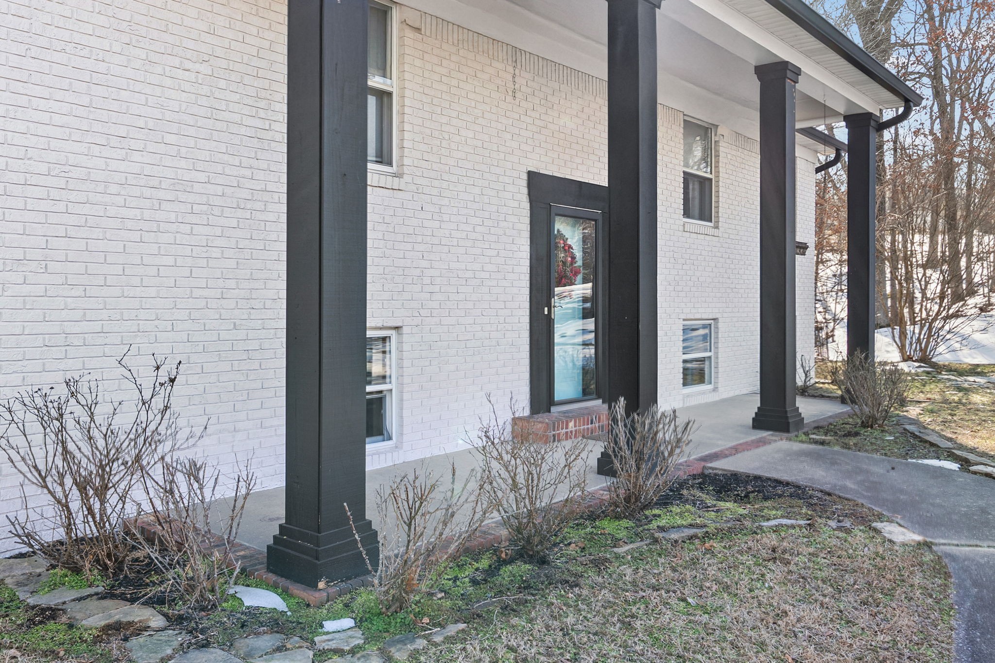 148 Green Hill Drive Grand Rivers, KY 42045 - Photo 5 of 65 a front view of a house with a yard