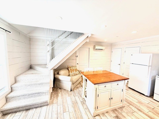 148 Green Hill Drive Grand Rivers, KY 42045 - Photo 57 of 65 a view of a kitchen with white cabinets and entryway
