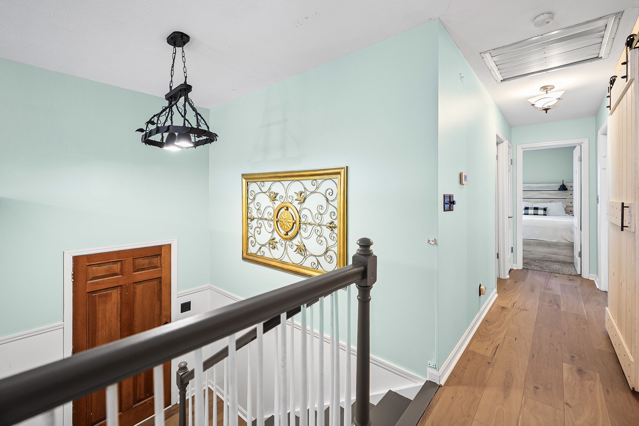148 Green Hill Drive Grand Rivers, KY 42045 - Photo 8 of 65 a view of a hallway view with wooden floor and staircase