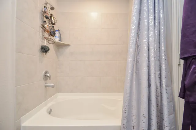 a view of a house with a washer and dryer