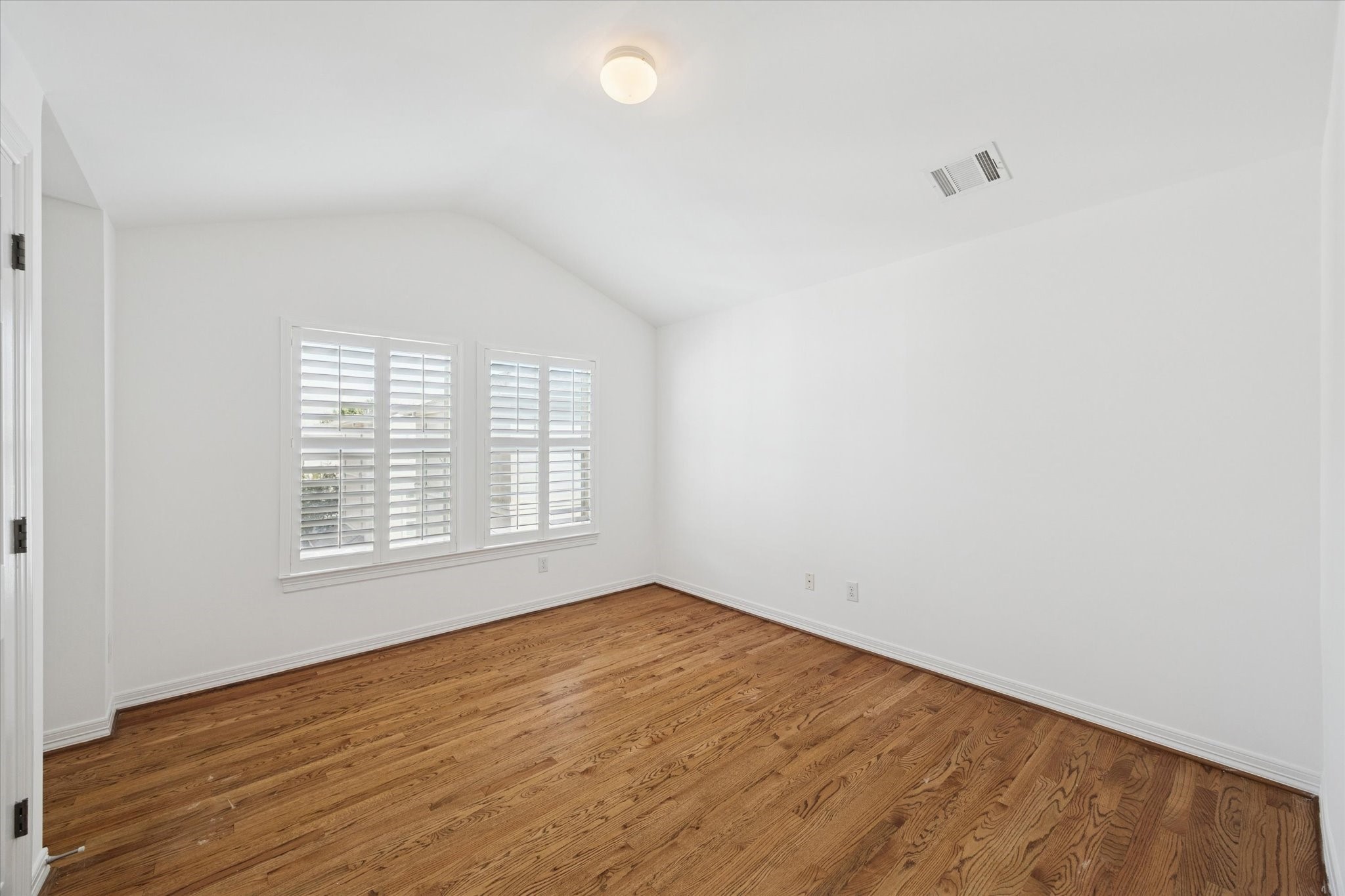 2638 Wroxton Road West University Place, TX 77005 - Photo 26 of 31 The bright guest room likewise has beautiful hardwoods
