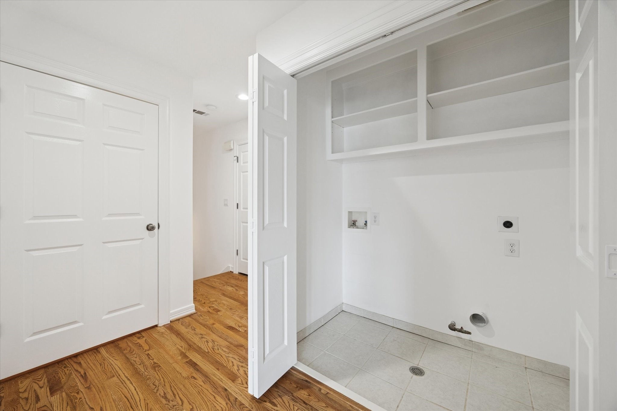 2638 Wroxton Road West University Place, TX 77005 - Photo 29 of 31 The third-floor has a nice laundry area with shelves