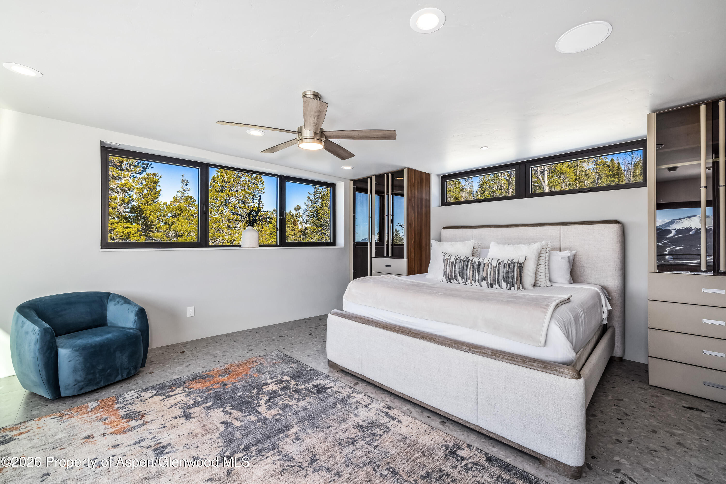 316 Fuller Placer Road Breckenridge, CO 80424 - Photo 41 of 52 a bedroom with a bed and a painting on the wall