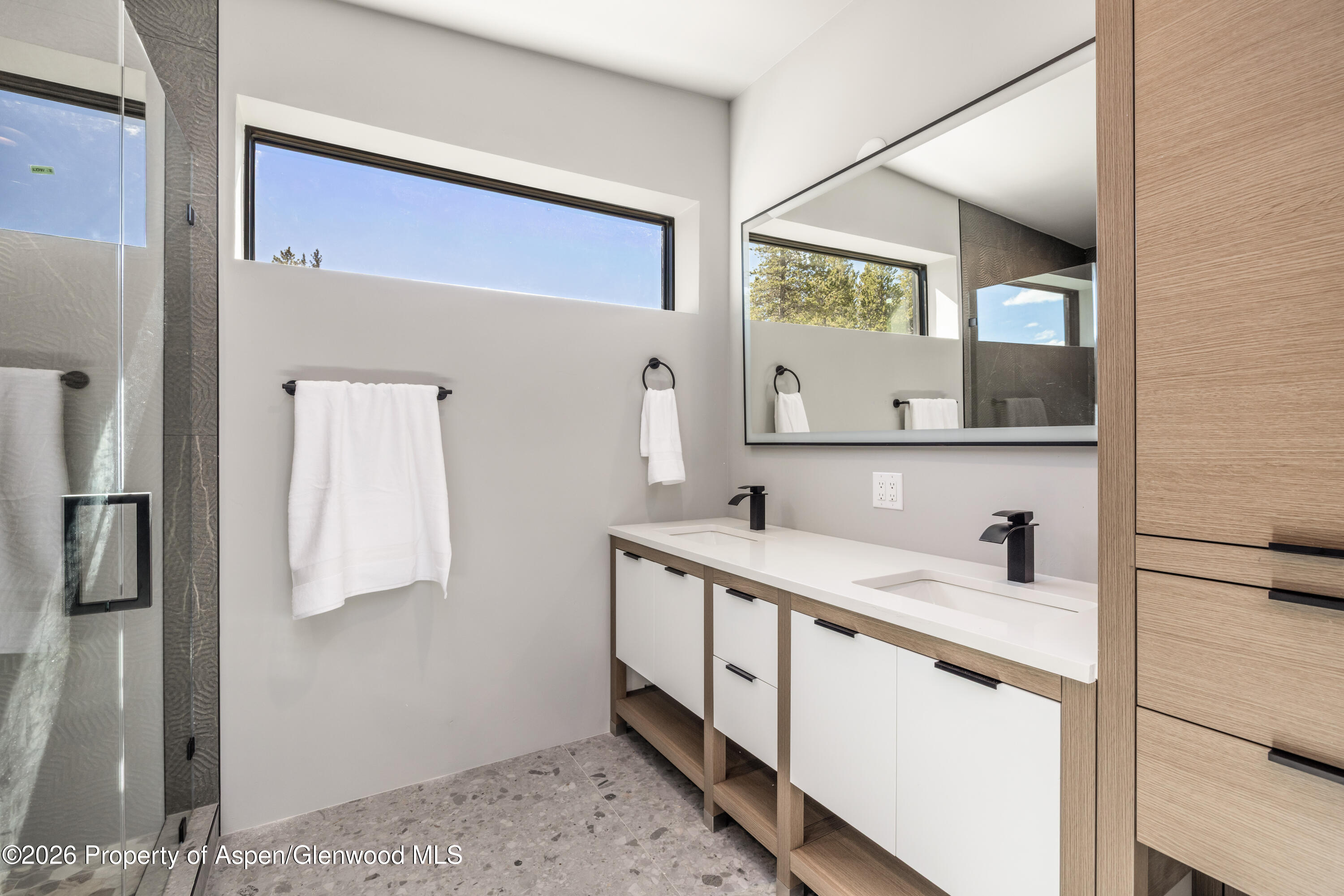 316 Fuller Placer Road Breckenridge, CO 80424 - Photo 42 of 52 a bathroom with a sink and a mirror