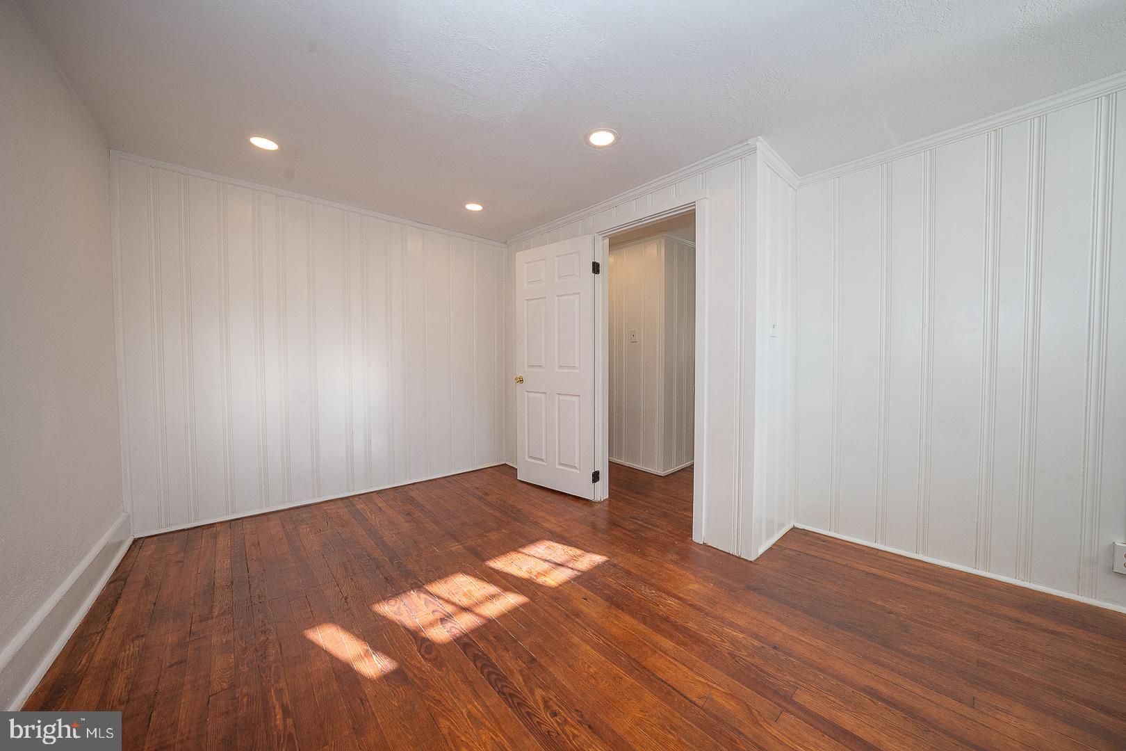 875 Old State Road Berwyn, PA 19312 - Photo 17 of 30 a view of empty room with wooden floor