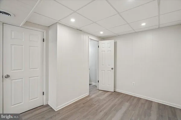 a bathroom with a toilet sink and shower