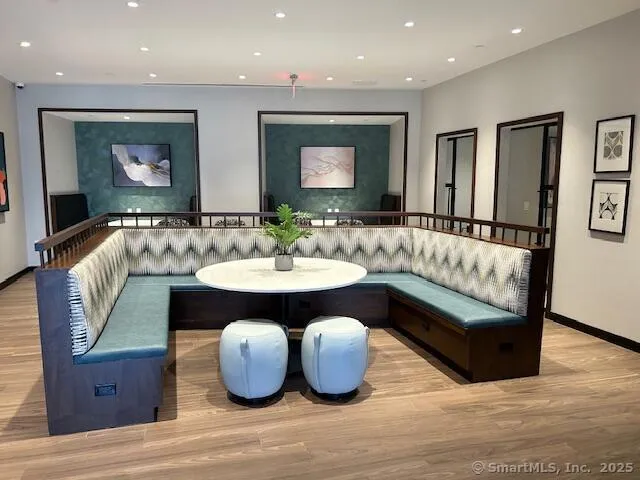 a view of a chairs and table in a patio