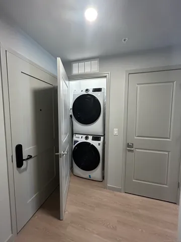a bathroom with a washer and dryer