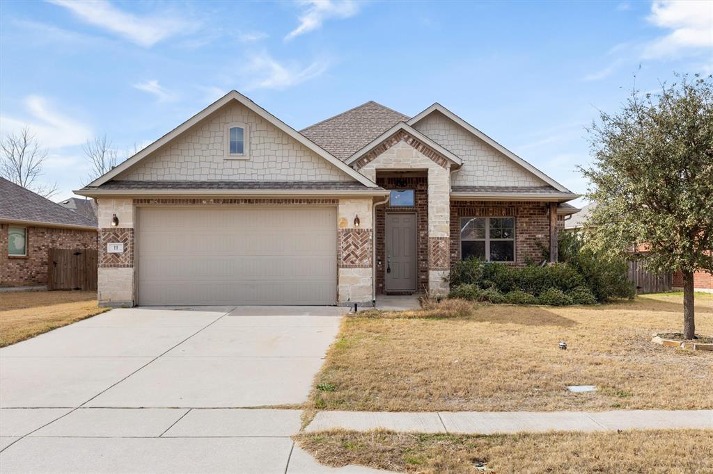 11 Pleasant Valley Sanger, TX 76266 - Photo 1 of 20 a front view of a house with a yard