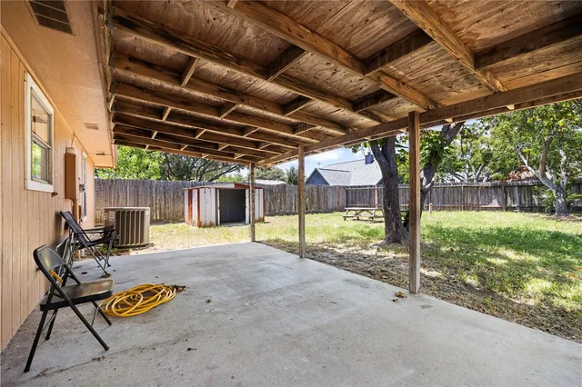 a view of swimming pool with a backyard
