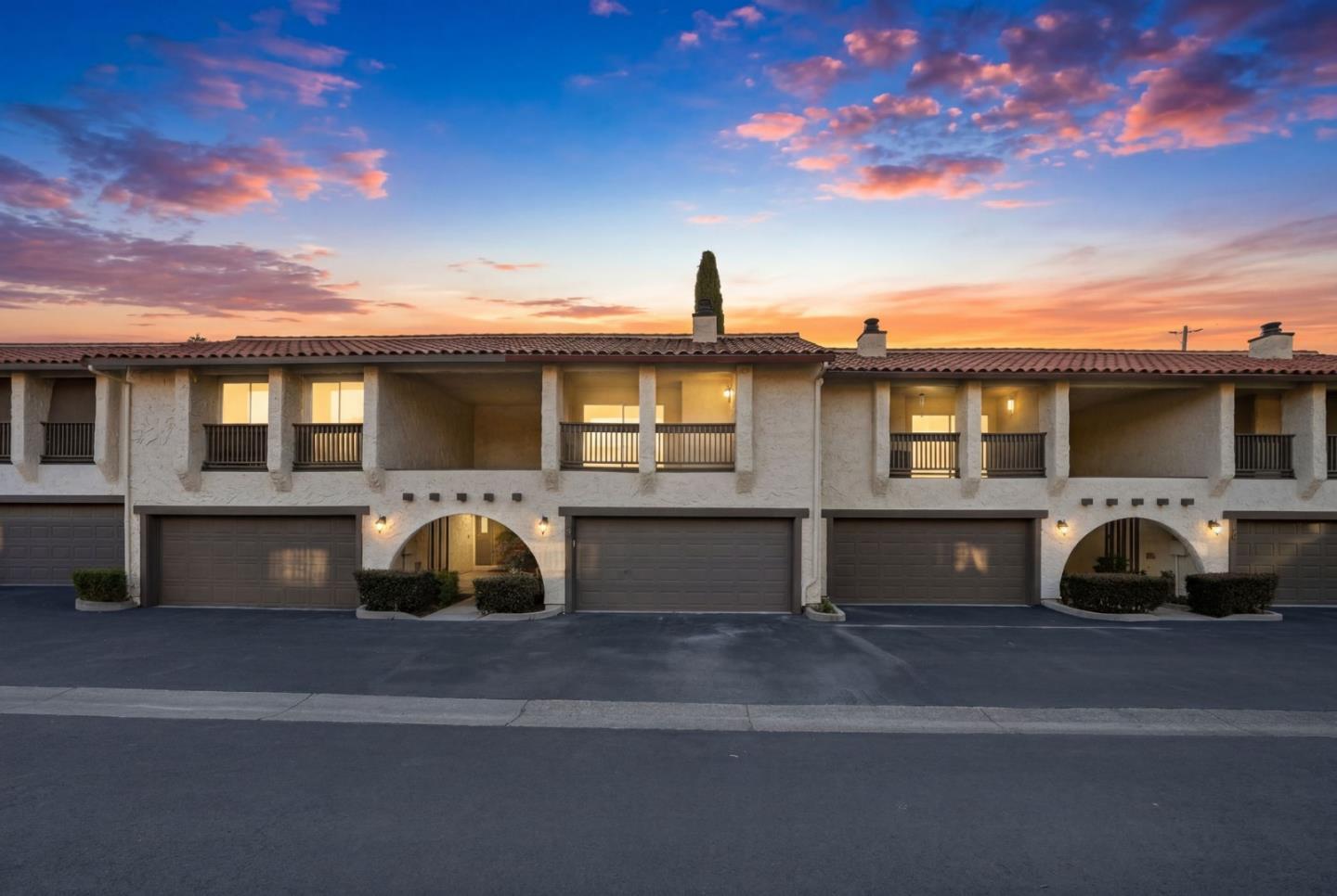 409 Puerto Place Hayward, CA 94541 - Photo 4 of 54 a view of a car park in front of house