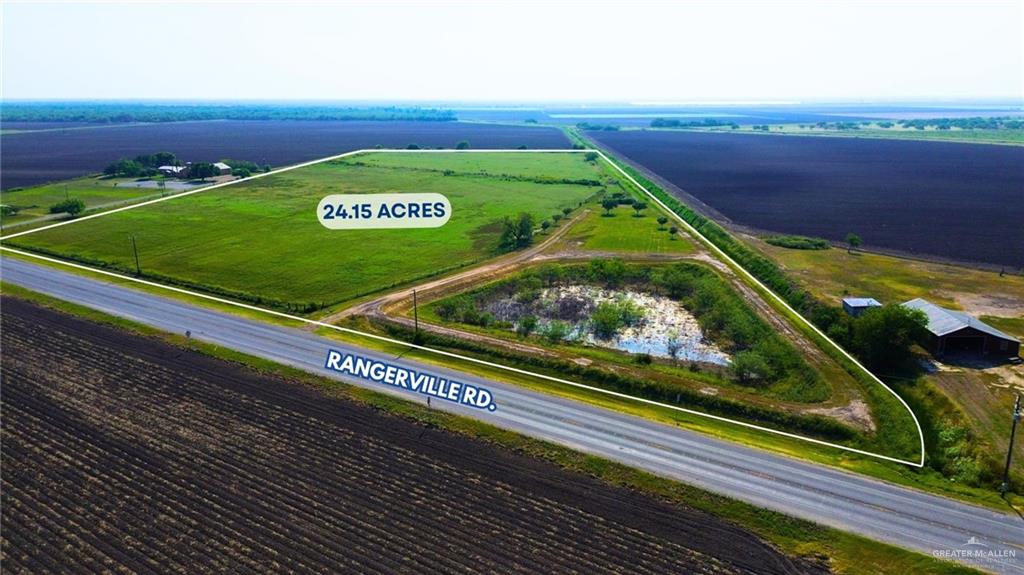 a view of a back yard of the green space