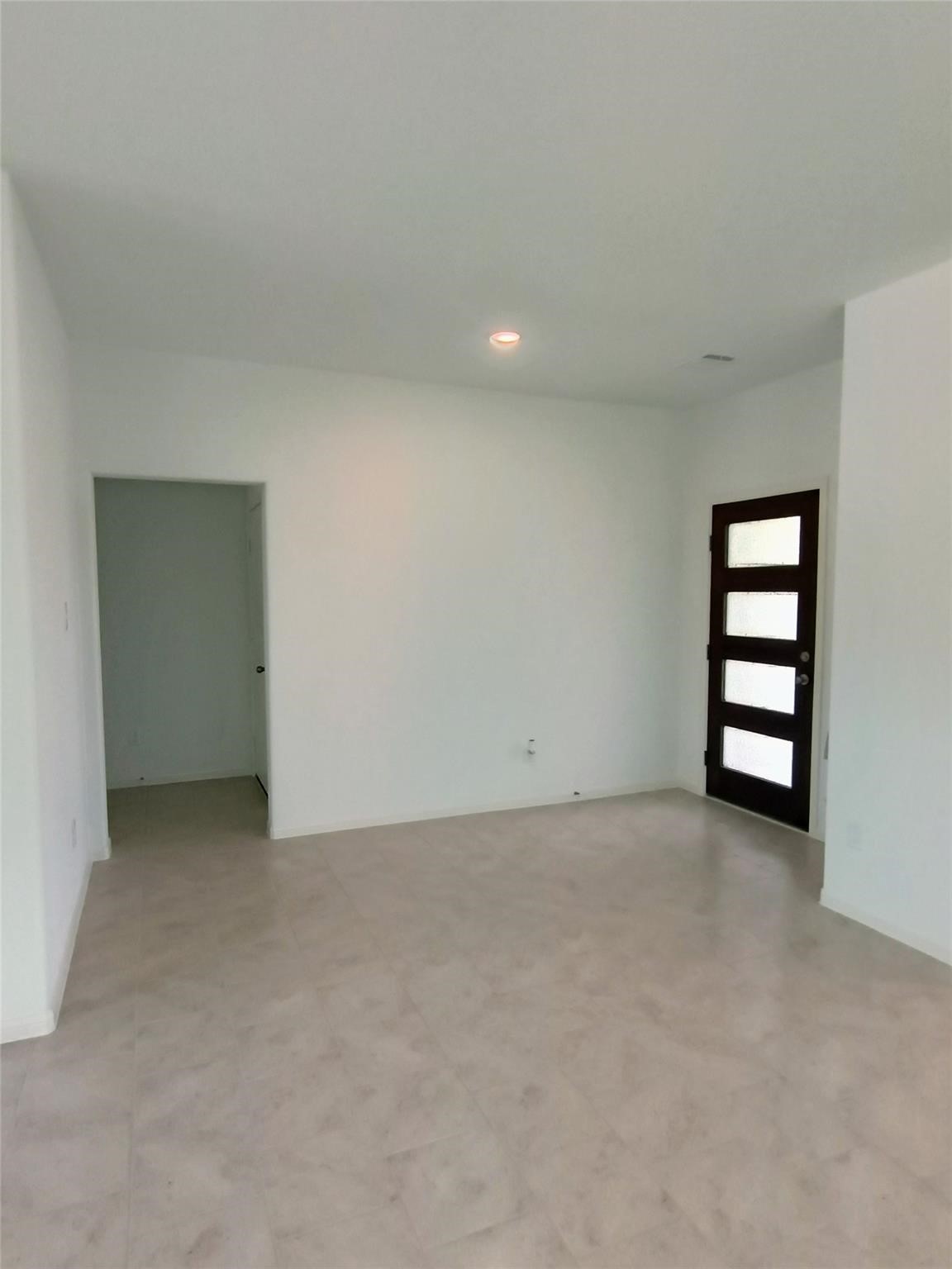 15924 Cy Young Court Splendora, TX 77372 - Photo 2 of 29 an empty room with windows and closet