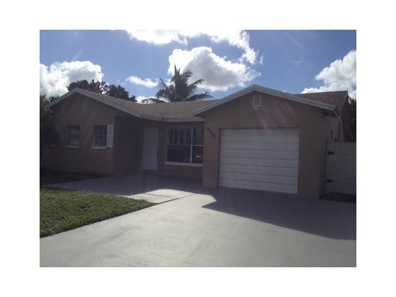 8992 Southwest 7th Street Boca Raton, FL 33433 - Photo 1 of 23 Exterior Front