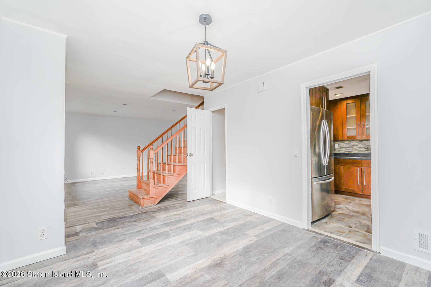 1818 Forest Hill Road Staten Island, NY 10306 - Photo 5 of 36 a view of an entryway with wooden floor