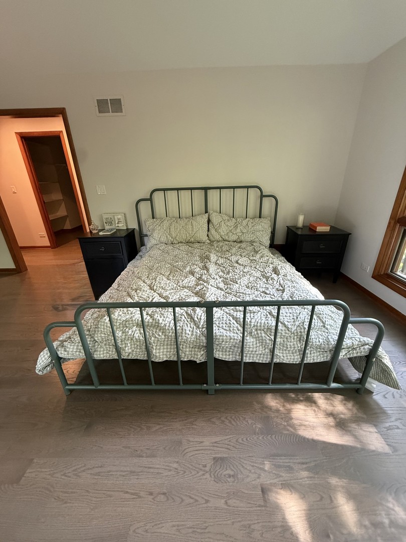 2841 Orange Brace Road Deerfield, IL 60015 - Photo 13 of 30 a bedroom with a bed chair and window