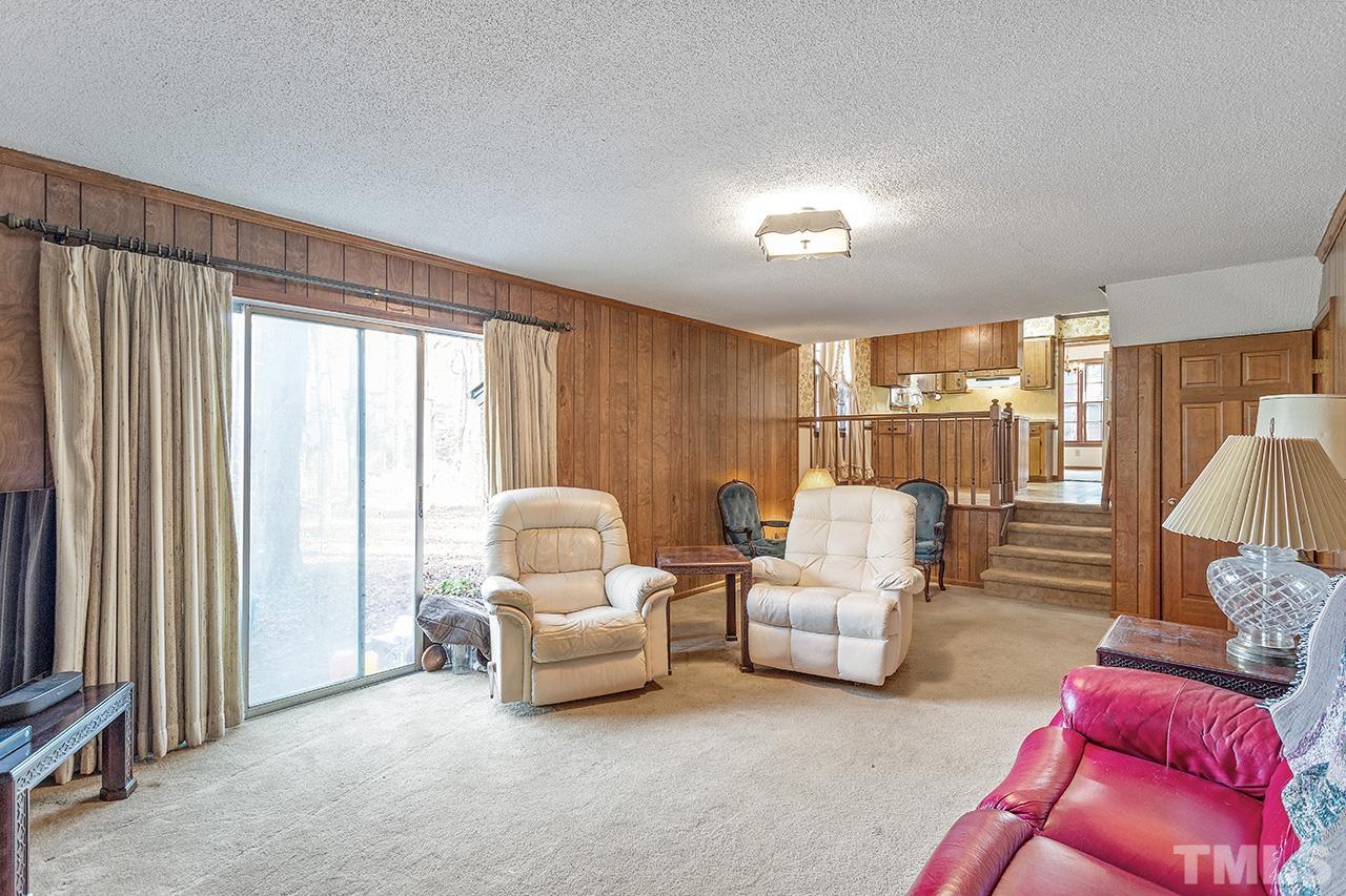 241 Fairview Road Cary, NC 27511 - Photo 15 of 34 a living room with furniture and a large window