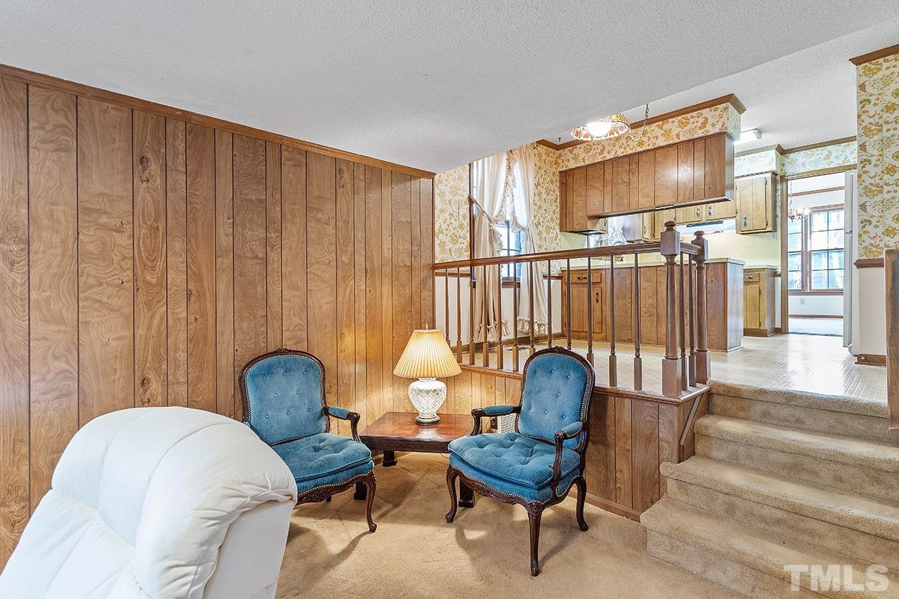 241 Fairview Road Cary, NC 27511 - Photo 18 of 34 a living room with furniture and a potted plant