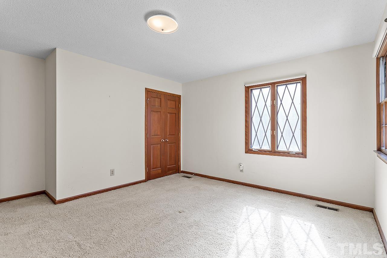 241 Fairview Road Cary, NC 27511 - Photo 24 of 34 an empty room with windows