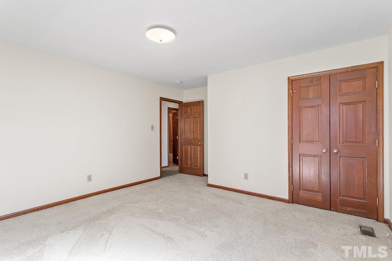 241 Fairview Road Cary, NC 27511 - Photo 25 of 34 an empty room with closet area