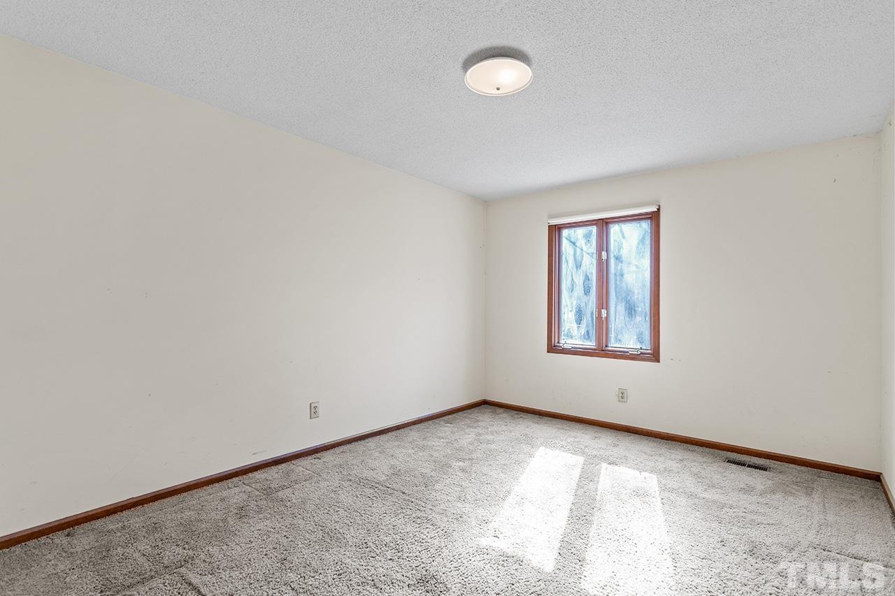 241 Fairview Road Cary, NC 27511 - Photo 26 of 34 an empty room with a window