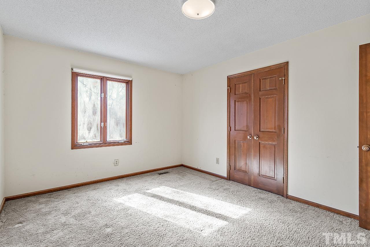 241 Fairview Road Cary, NC 27511 - Photo 27 of 34 an empty room with windows and closet