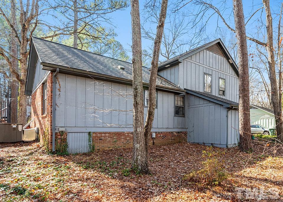 241 Fairview Road Cary, NC 27511 - Photo 33 of 34 a house with trees in front of it