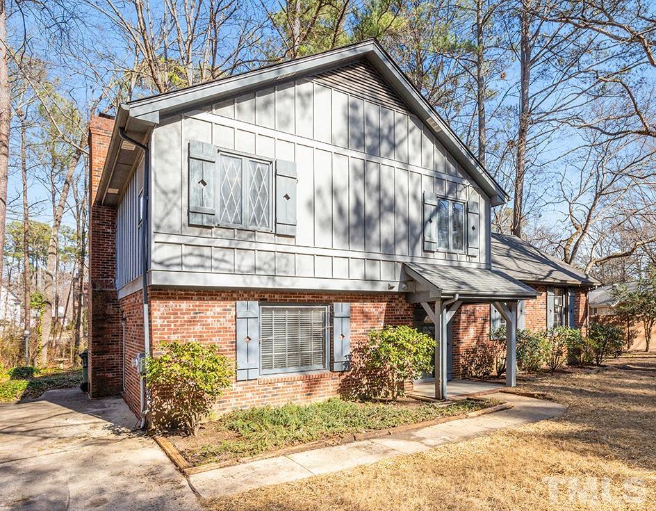 241 Fairview Road Cary, NC 27511 - Photo 34 of 34 a front view of a house with garden