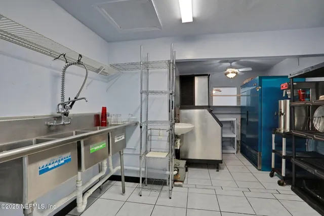 a view of kitchen with furniture and window