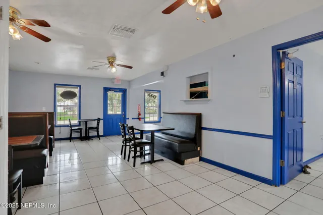 a view of a dining room with furniture