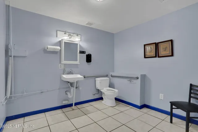 a room with lots of furniture and clutter