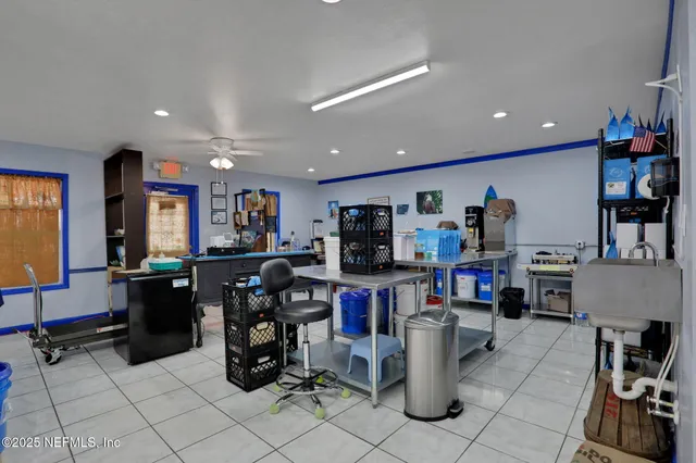 a view of a workspace with furniture