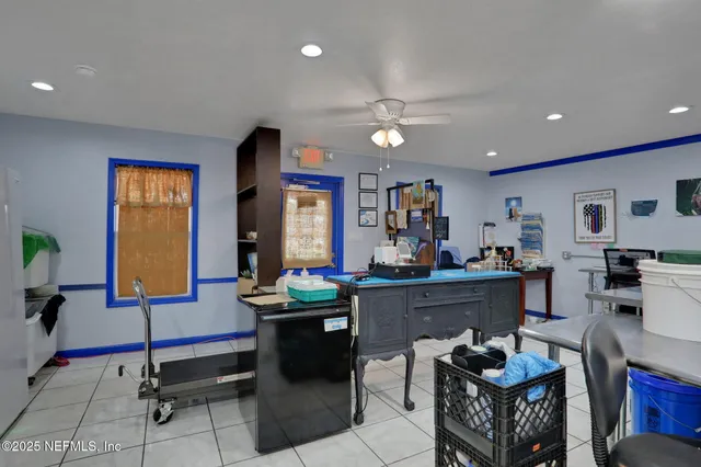 a view of yard with swimming pool and green space