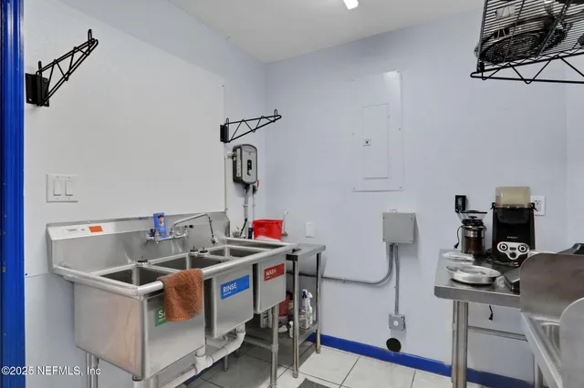 a swimming pool with outdoor seating and yard