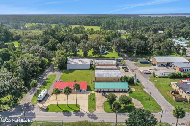 a view of a lake and a yard